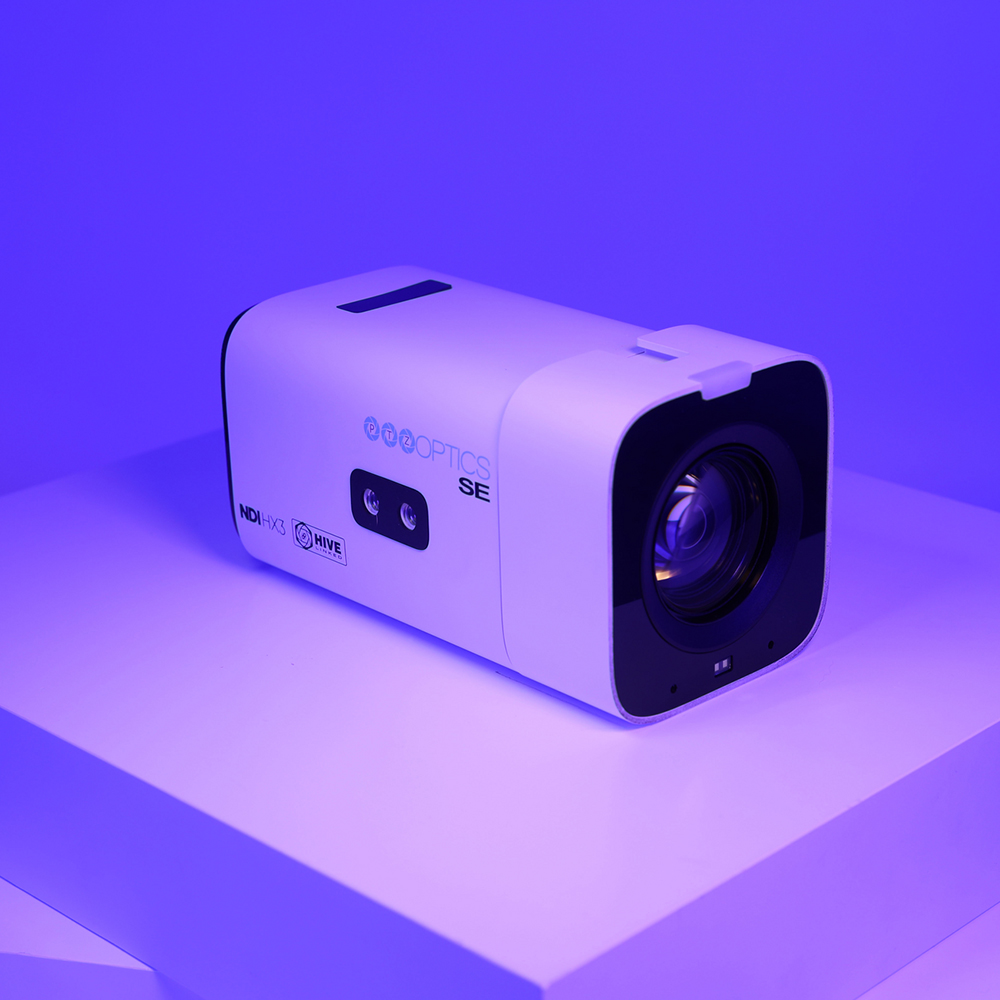 Studio SE white on a purple gradient background